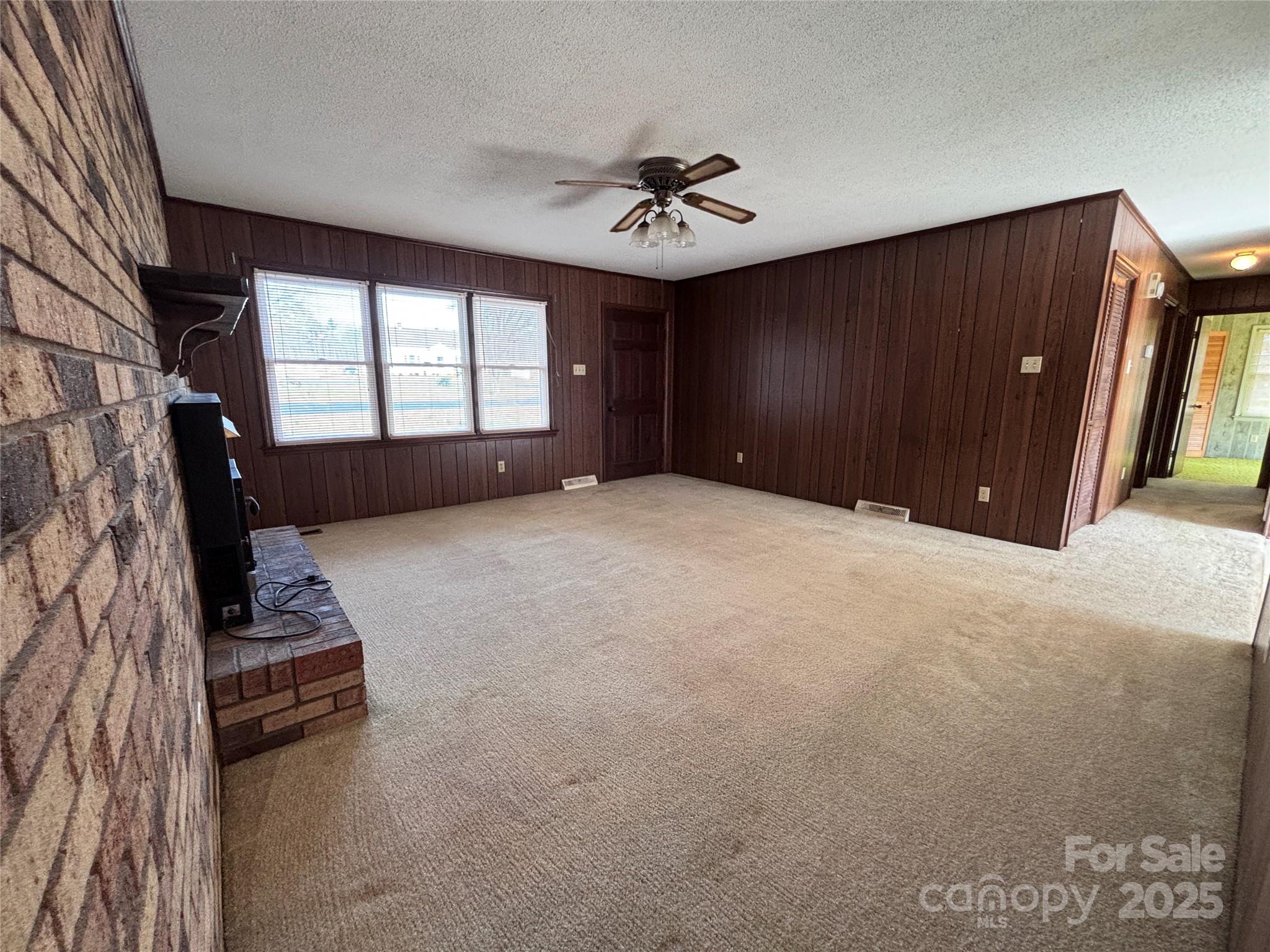 14740 Hatley-Burris Road Oakboro, NC 28129 - Photo 10 of 26 a view of an empty room with a window
