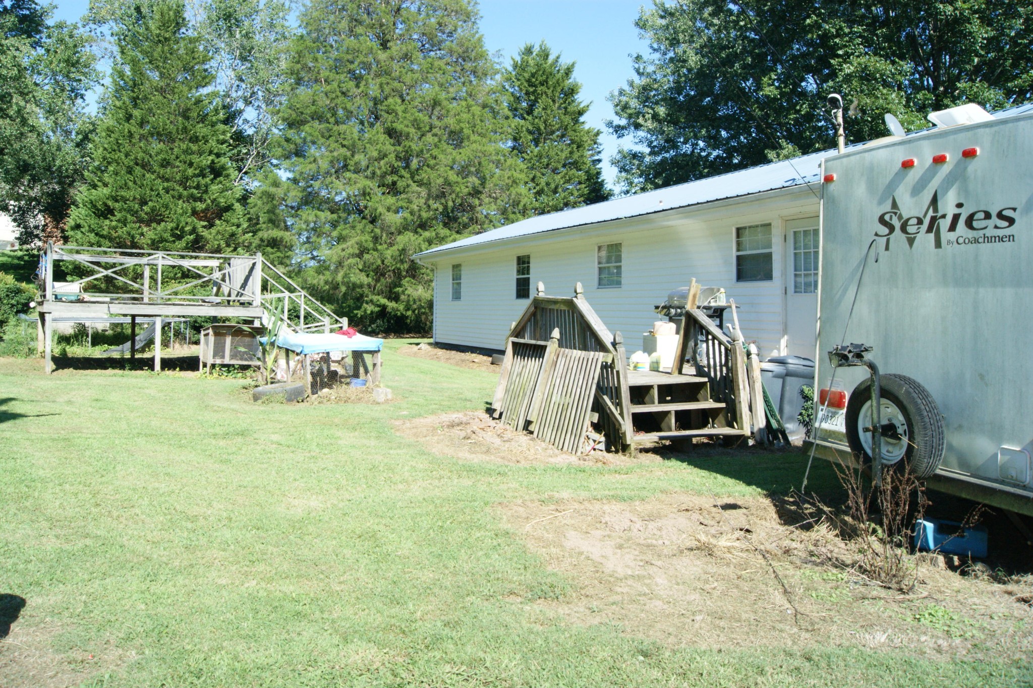 404 Reliance Road Tellico Plains, TN 37385 - Photo 22 of 29 a view of a house with backyard