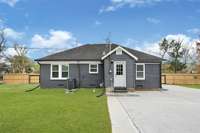 a front view of a house with yard