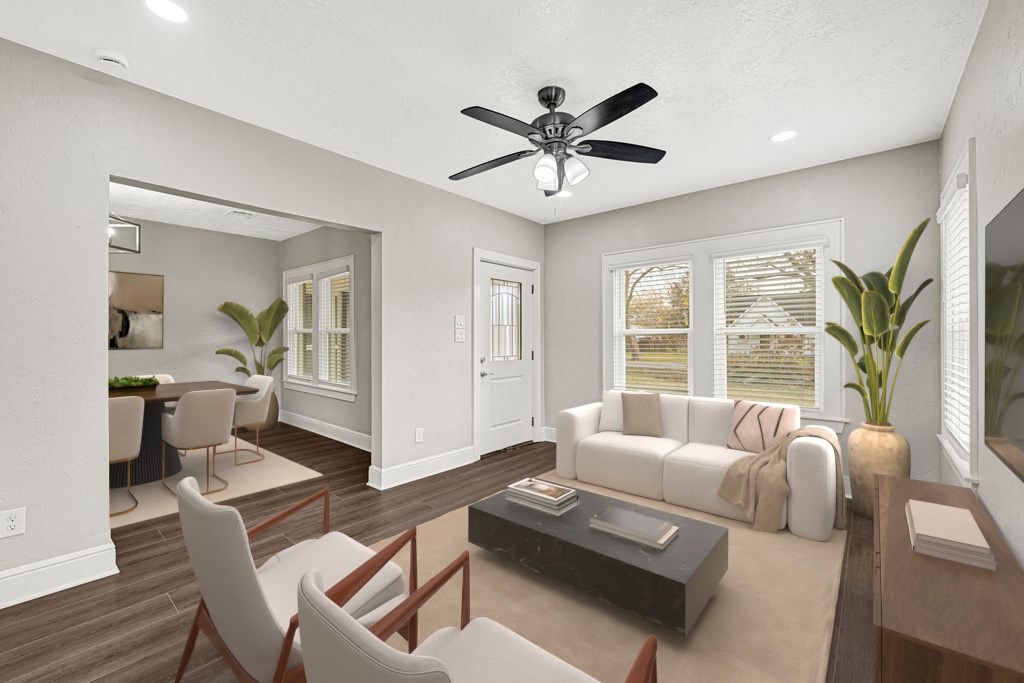 7403 Cayton Street Houston, TX 77061 - Photo 4 of 18 a living room with furniture and a large window