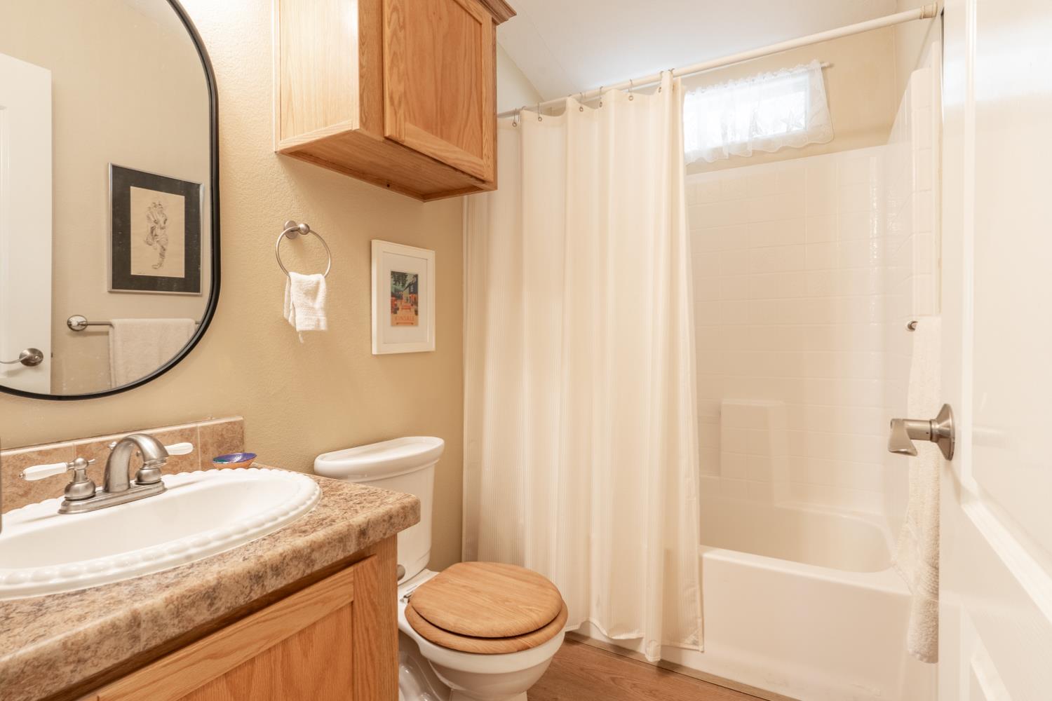 1273 South Rice Road, Unit 12 Ojai, CA 93023 - Photo 11 of 27 a bathroom with a granite countertop sink toilet and shower