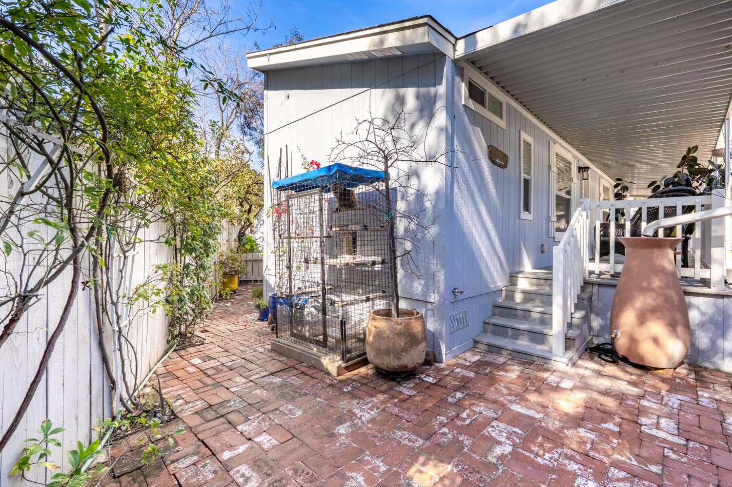 1273 South Rice Road, Unit 12 Ojai, CA 93023 - Photo 22 of 27 a view of a house with a patio