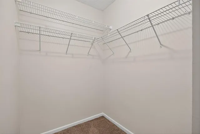 a view of a room with racks on the wall