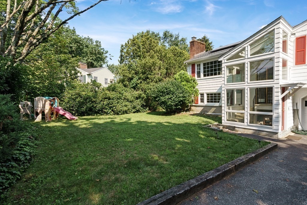 36 Putnam Road Bedford, MA 01730 - Photo 15 of 15 a view of an apartment with a garden