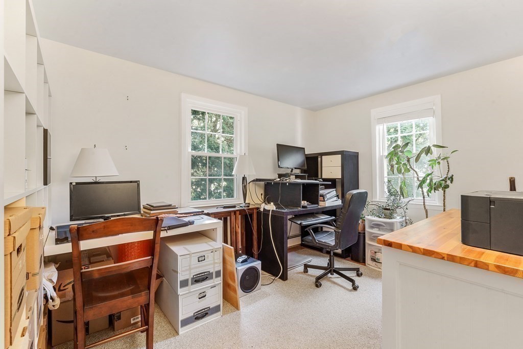 36 Putnam Road Bedford, MA 01730 - Photo 6 of 15 a view of a workspace with furniture and a window