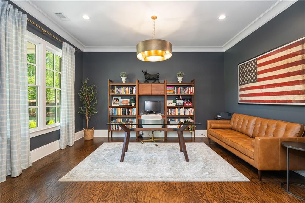4184 Thompson Mill Road Buford, GA 30519 - Photo 11 of 53 a living room with furniture and a large window