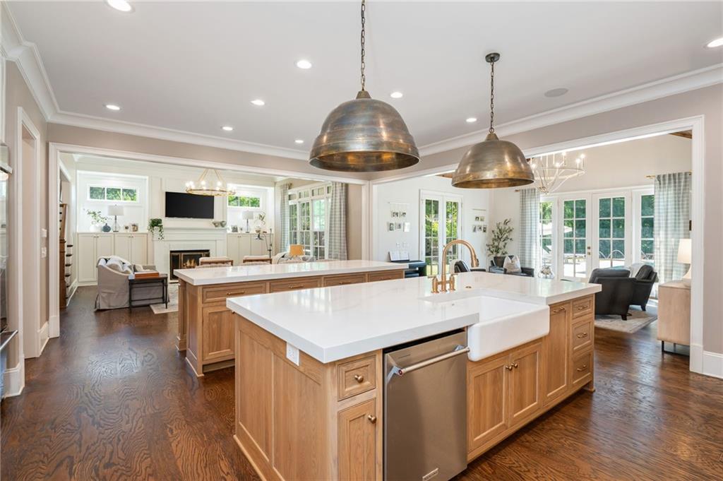 4184 Thompson Mill Road Buford, GA 30519 - Photo 23 of 53 a very nice looking dining room with a table and chairs