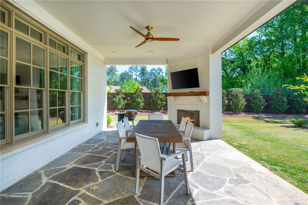 4184 Thompson Mill Road Buford, GA 30519 - Photo 47 of 53 a view of a patio with a backyard