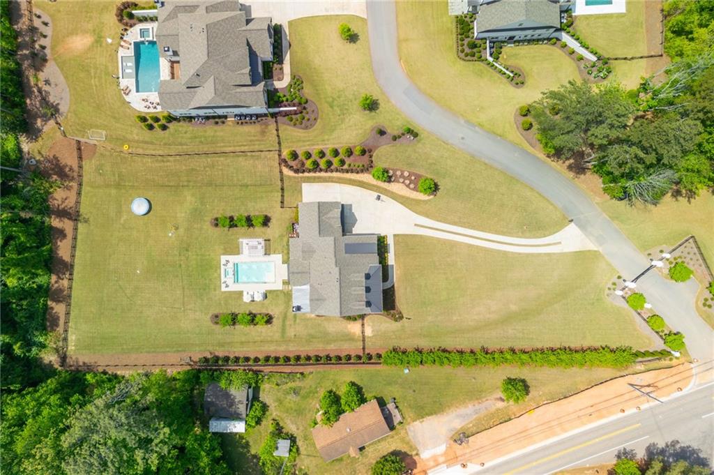 4184 Thompson Mill Road Buford, GA 30519 - Photo 50 of 53 an aerial view of a swimming pool