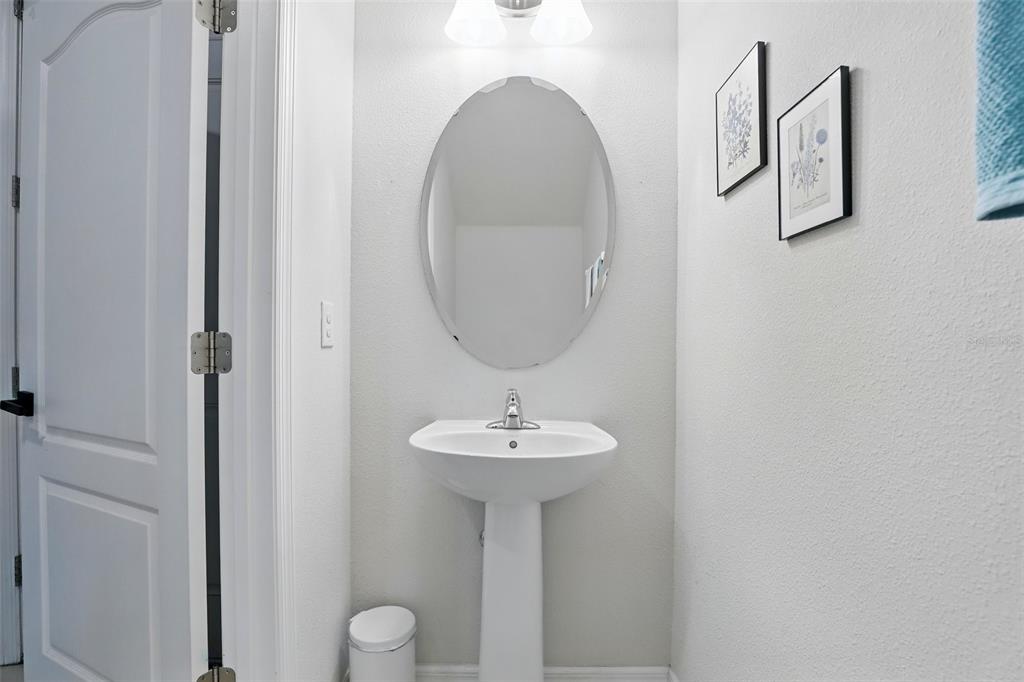 1338 Riley Circle Deland, FL 32724 - Photo 12 of 39 a bathroom with a sink and a mirror