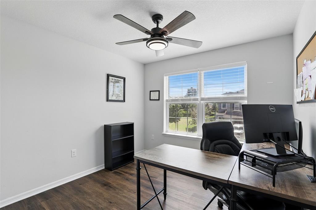 1338 Riley Circle Deland, FL 32724 - Photo 21 of 39 a workspace with furniture and a window