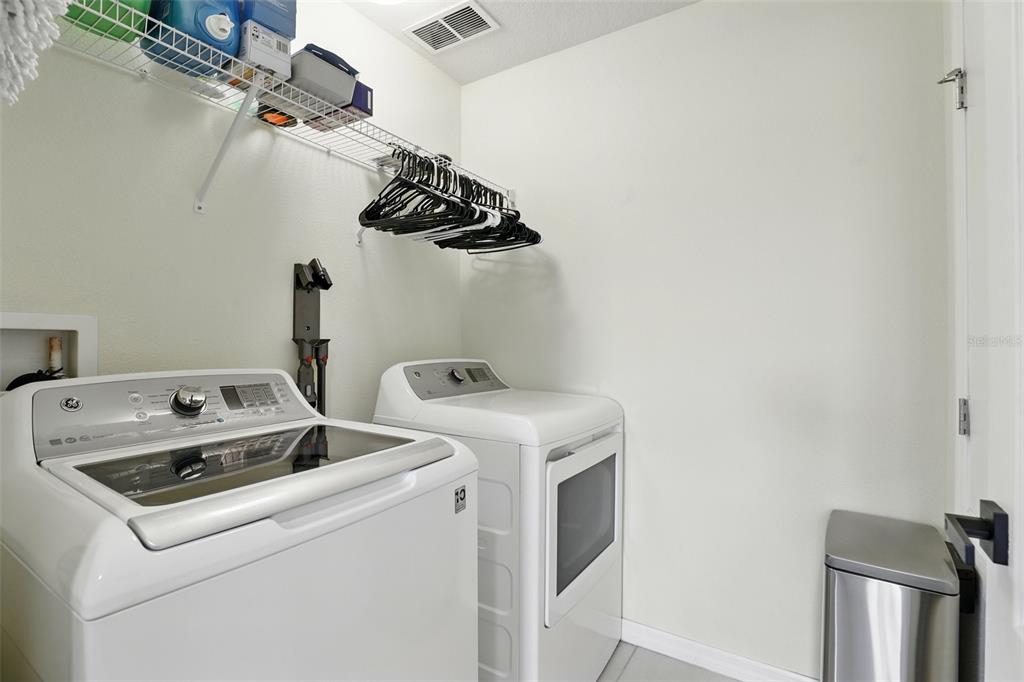 1338 Riley Circle Deland, FL 32724 - Photo 27 of 39 a utility room with dryer and washer