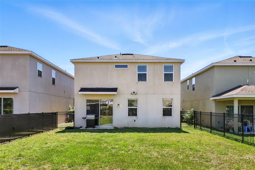 1338 Riley Circle Deland, FL 32724 - Photo 29 of 39 a front view of a house with a yard