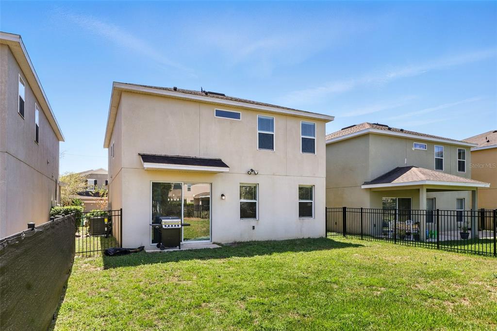 1338 Riley Circle Deland, FL 32724 - Photo 30 of 39 a view of an house with backyard porch and furniture