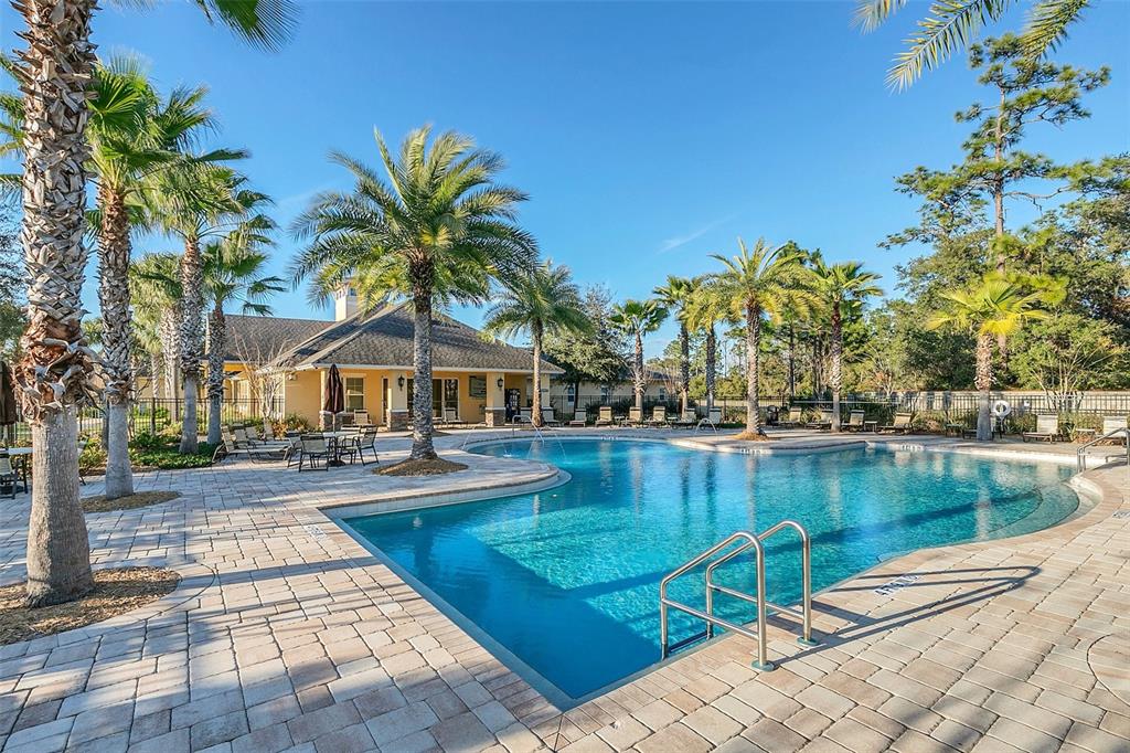 1338 Riley Circle Deland, FL 32724 - Photo 36 of 39 a view of a lake with couches and trees