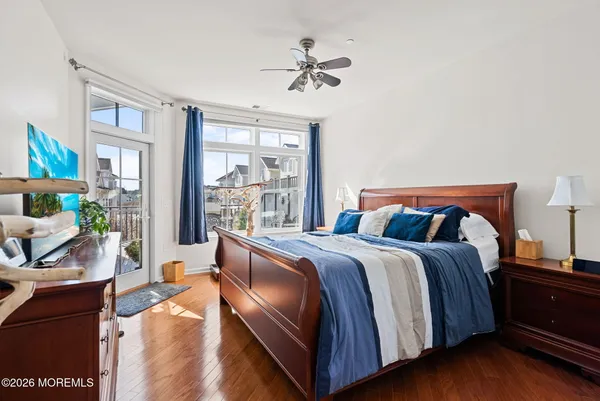 a bed room with a bed and a chair