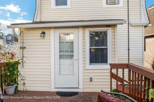 a view of a porch with a bench