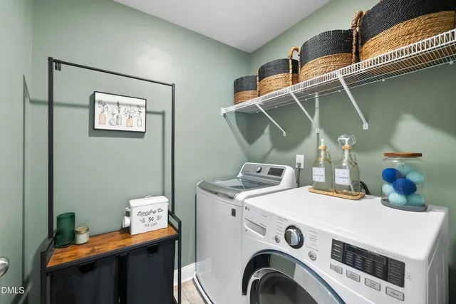 a work room with furniture and wooden floor