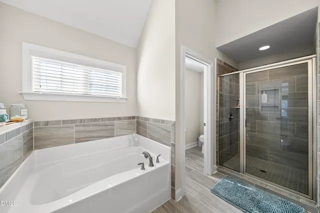 a bathroom with a granite countertop sink a large mirror and a vanity