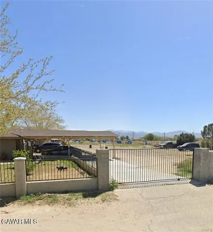a view of a balcony with an outdoor space