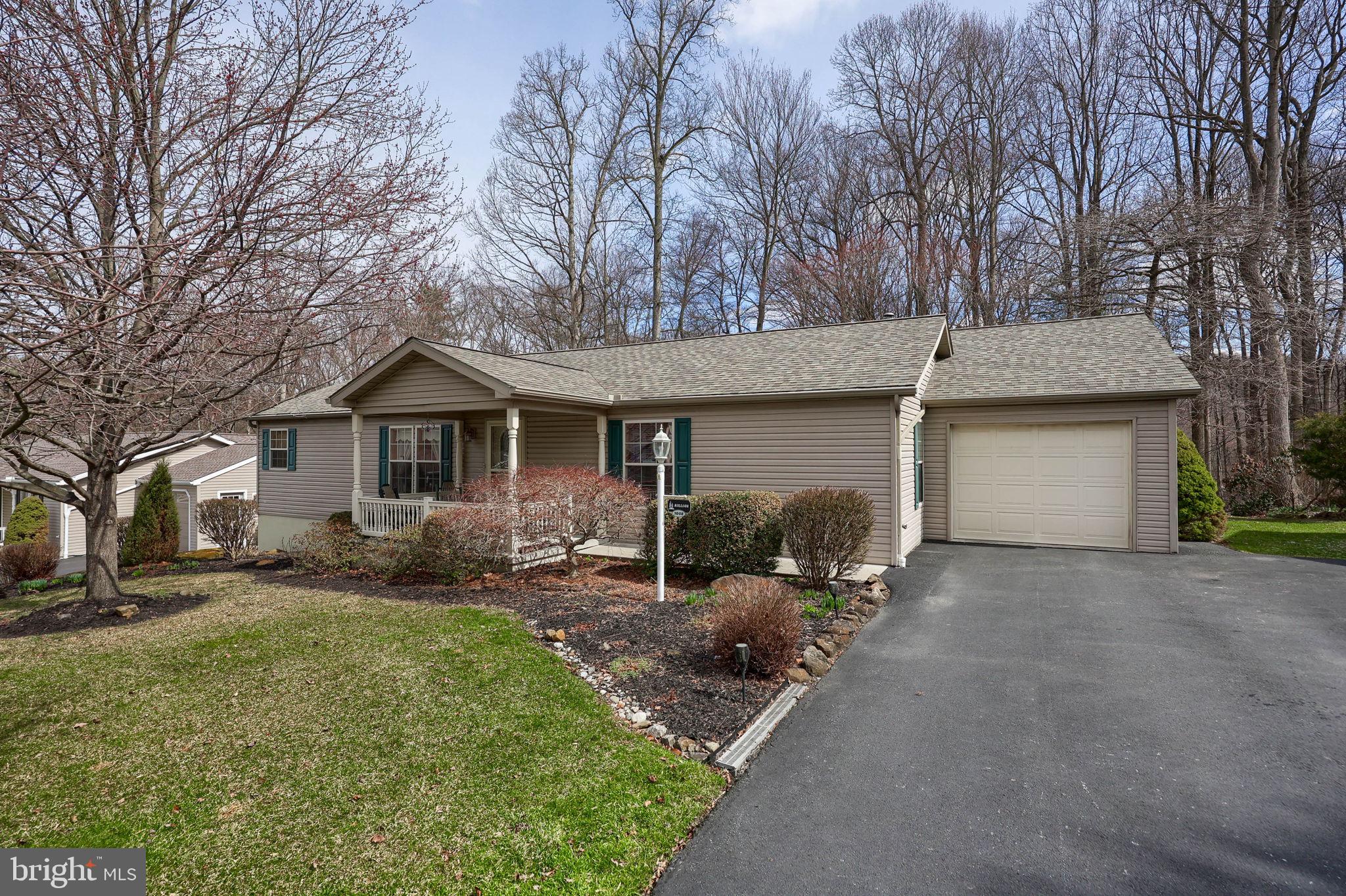 1048 Hemlock Circle Manheim, PA 17545 - Photo 1 of 1 a front view of a house with yard and parking