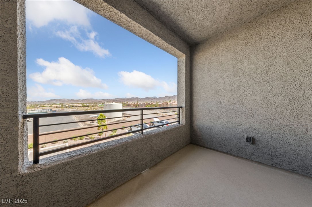 1561 Layla Crossing Avenue Henderson, NV 89002 - Photo 28 of 31 Balcony featuring a mountain view