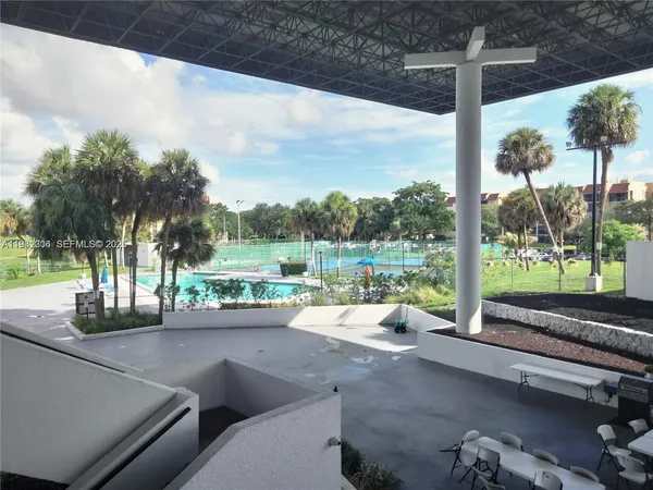 a view of a road with a patio