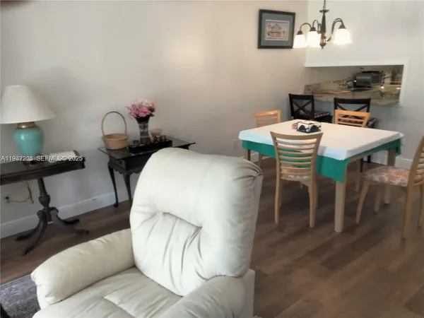 a bedroom with a bed and a table in it