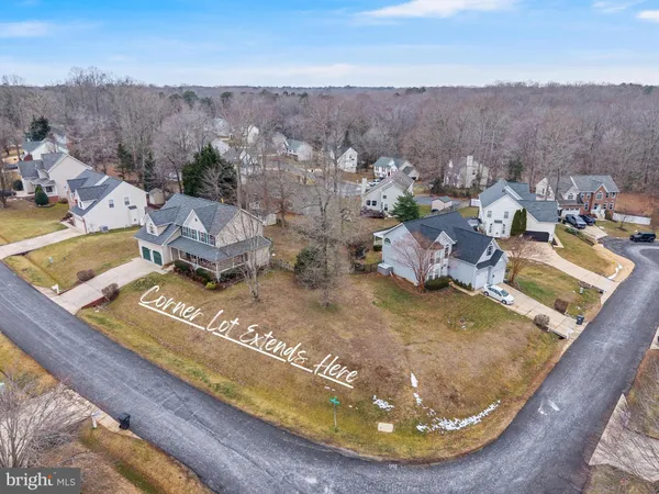 a view of swimming pool with a yard