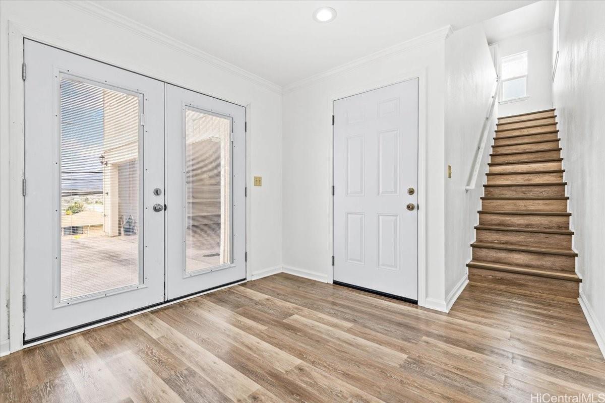 45-567 Keaahala Road, Unit A Kaneohe, HI 96744 - Photo 6 of 25 Newer side foyer to upstairs living qtrs