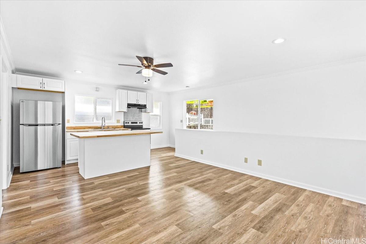 45-567 Keaahala Road, Unit A Kaneohe, HI 96744 - Photo 8 of 25 Newer side living to kitchen