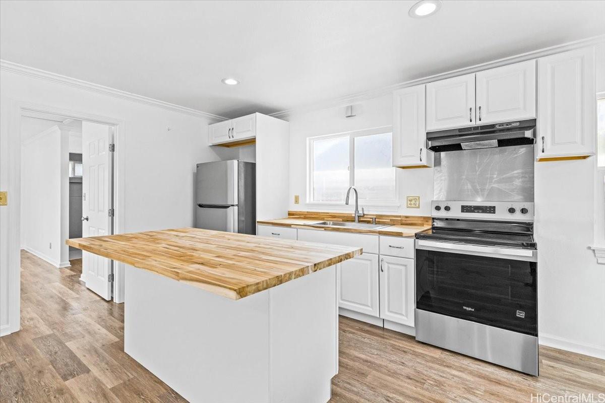 45-567 Keaahala Road, Unit A Kaneohe, HI 96744 - Photo 9 of 25 Newer side kitchen to BR