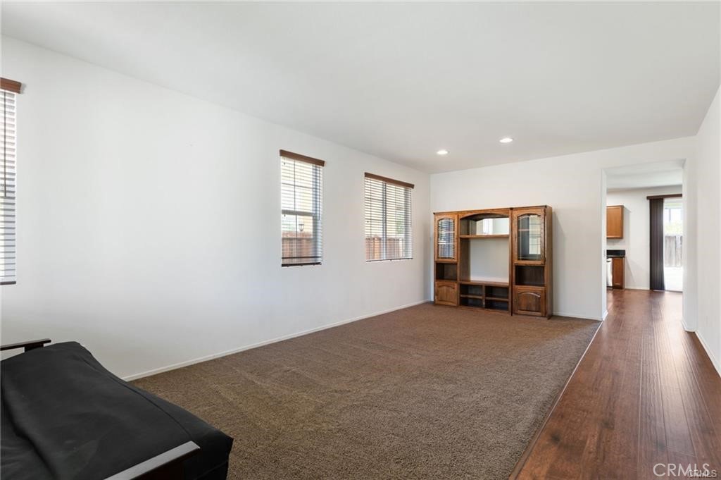 46545 Peach Tree Street Temecula, CA 92592 - Photo 3 of 30 a view of a livingroom with workspace and a window