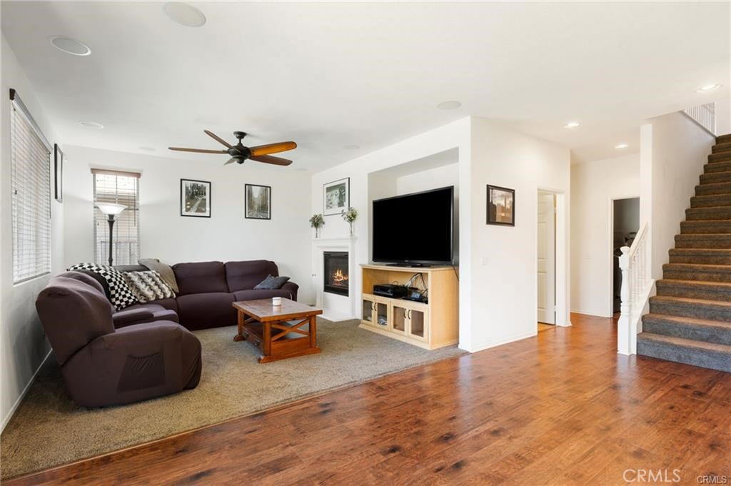 46545 Peach Tree Street Temecula, CA 92592 - Photo 7 of 30 a living room with furniture and a flat screen tv