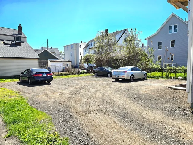 a cars parked in front of a house