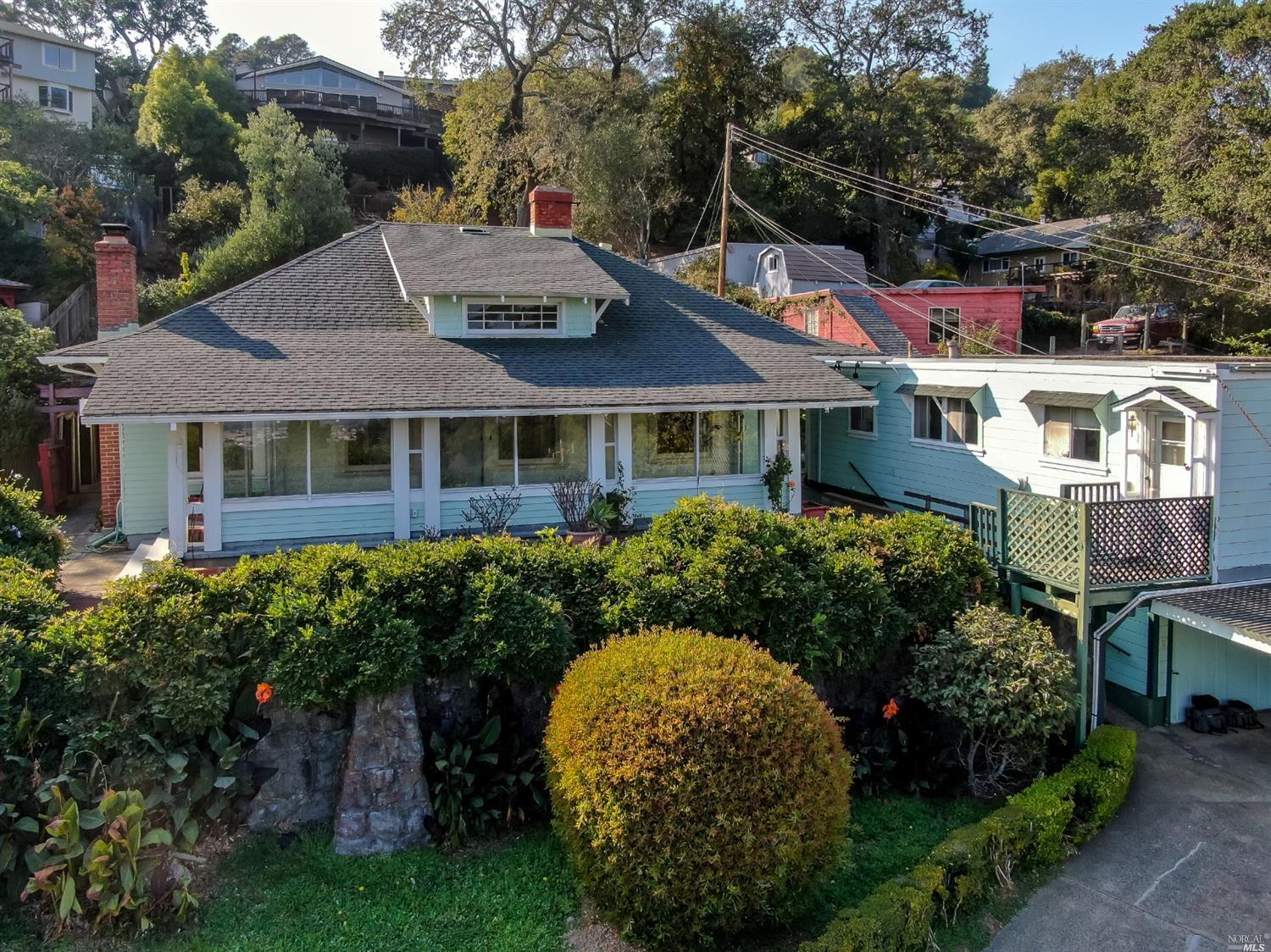 49 Reservoir Road San Rafael, CA 94901 - Photo 1 of 1 a aerial view of a house with garden space and trees