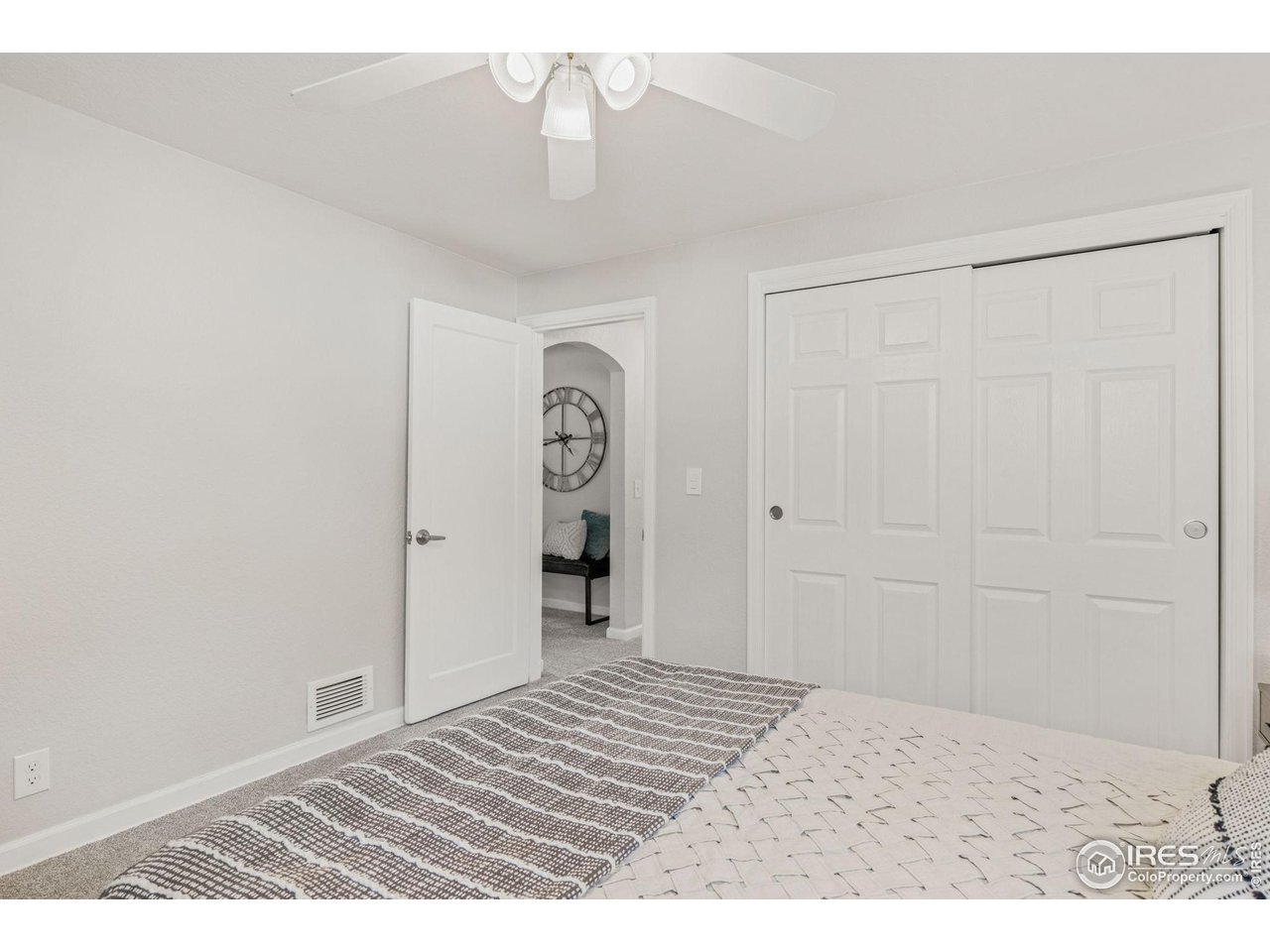 441 Sumner Street Longmont, CO 80501 - Photo 17 of 34 a view of a livingroom with wooden floor and a chandelier