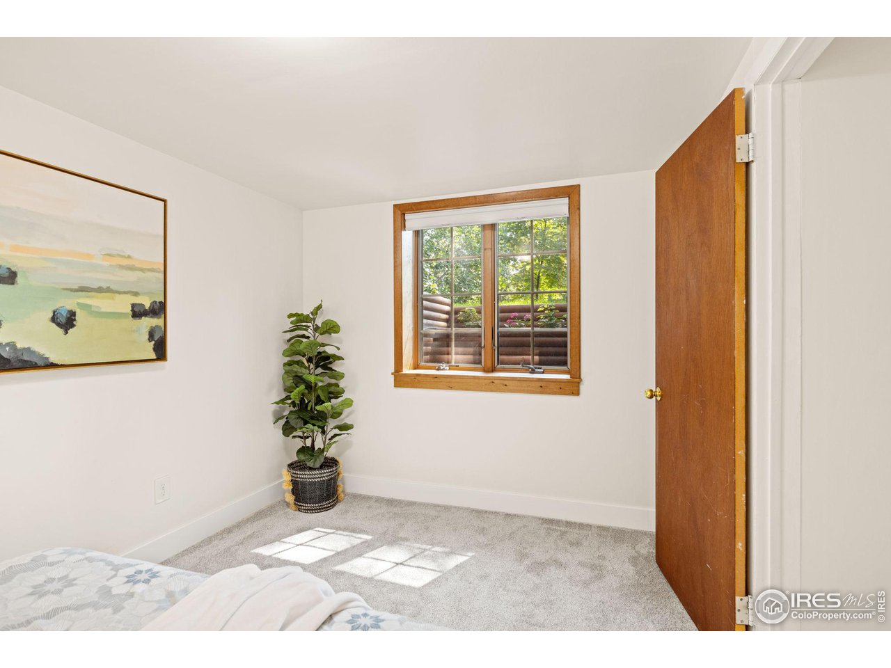 441 Sumner Street Longmont, CO 80501 - Photo 23 of 34 a view of entryway with wooden floor