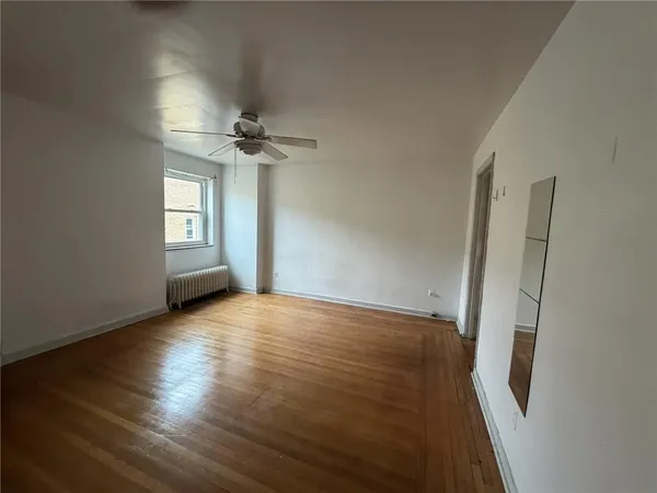 a view of wooden floor and staircase