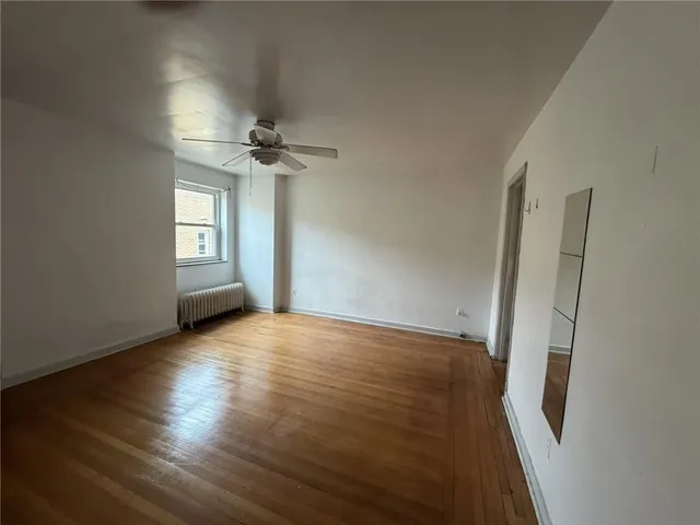 a view of wooden floor and staircase
