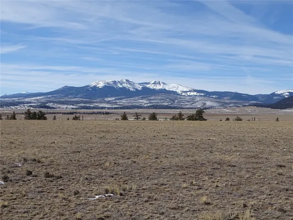 a view of a lake with mountains in the background