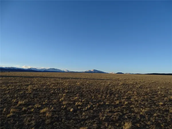 a view of ocean with mountain