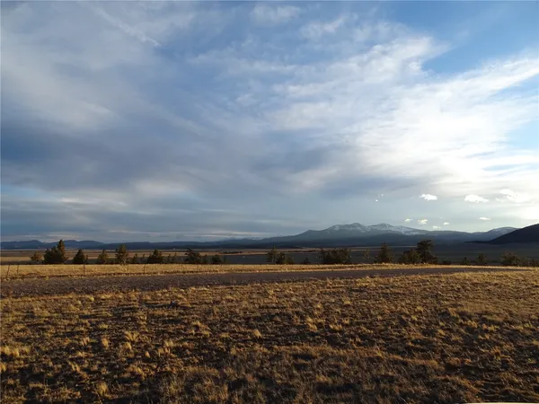 a view of an ocean and mountain