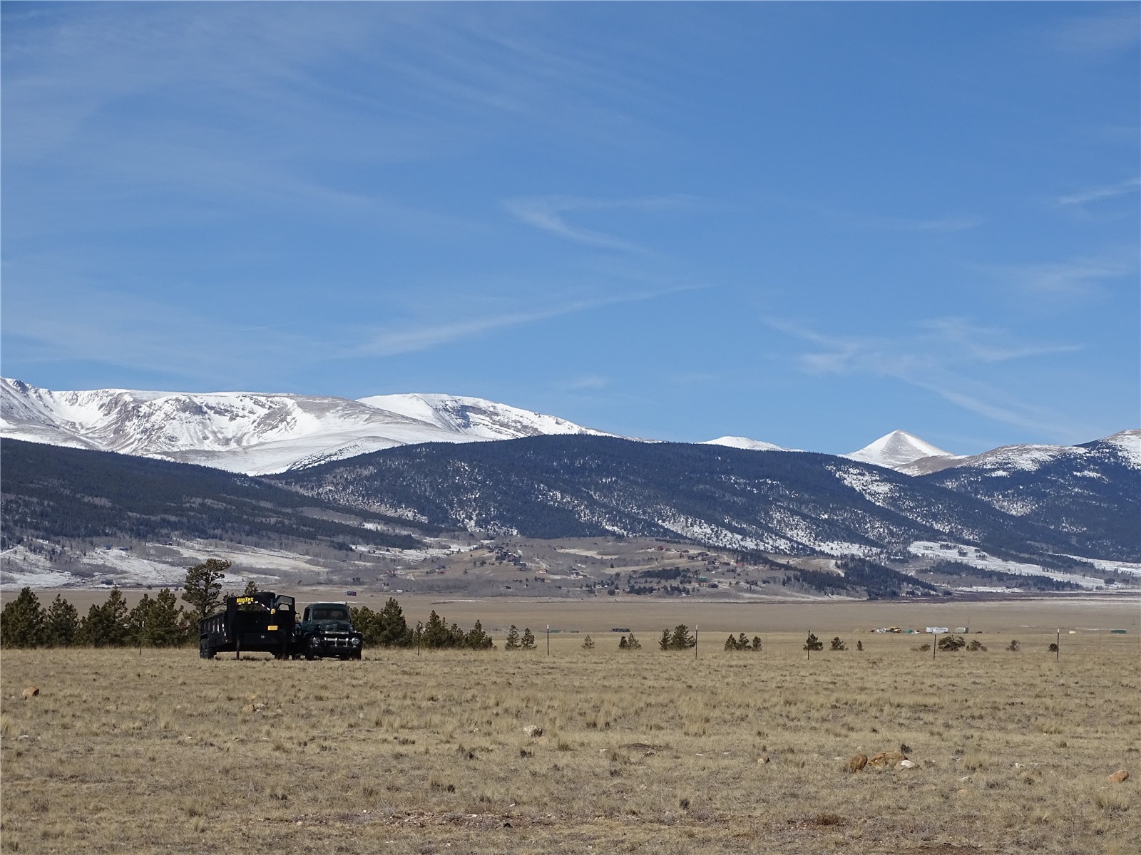 777 Rudisill Street Fairplay, CO 80440 - Photo 5 of 27 a view of a big yard with a mountain