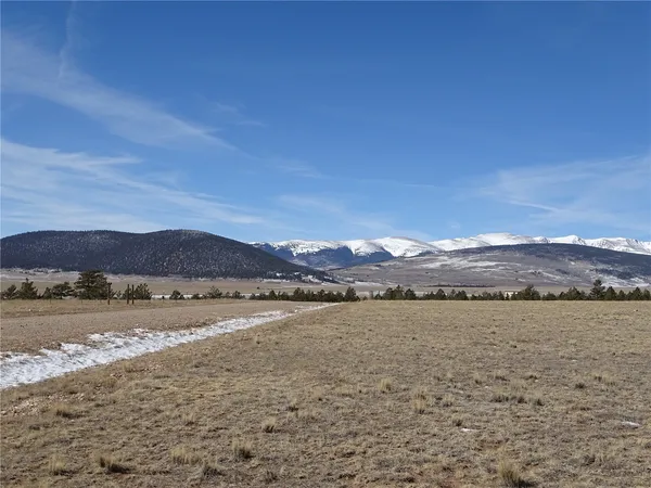 a view of lake with mountain