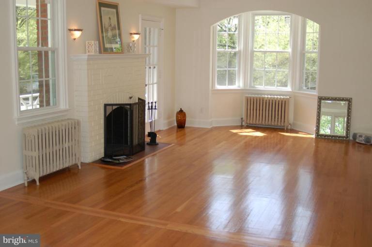 3125 Military Road Northwest Washington, DC 20015 - Photo 2 of 17 SPACIOUS LIV RM W/BAY WINDOW, FIREPLACE & HDW FLS.