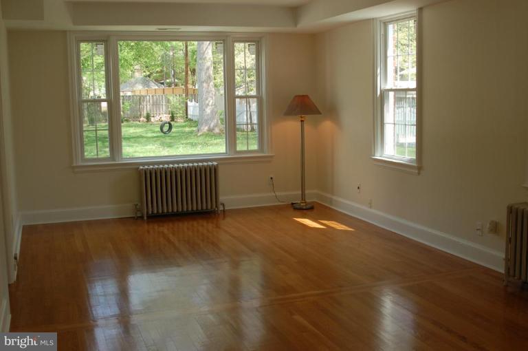 3125 Military Road Northwest Washington, DC 20015 - Photo 3 of 17 DOUBLE LIV RM W/ HUGE PIC WINDOW FACING REAR YARD
