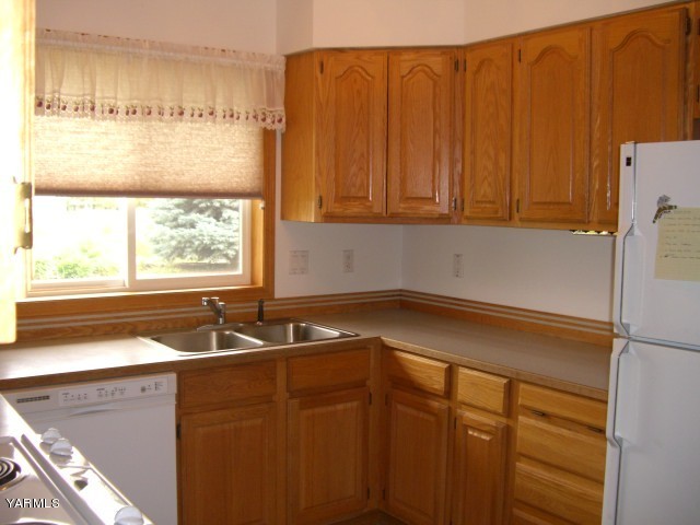 3303 Wiley Road Yakima, WA 98903 - Photo 5 of 9 a bathroom with a sink and a window