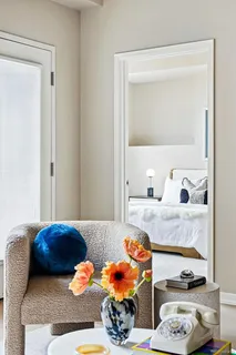 a bedroom with bed and window