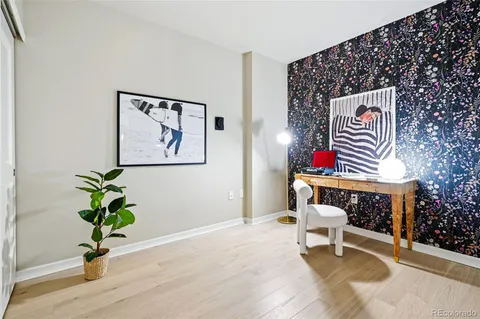 a front view of a house with table and chairs